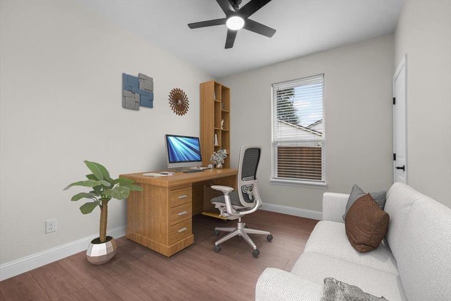 Office with hardwood / wood-style flooring and ceiling fan