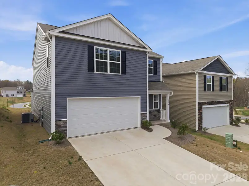 Front exterior of a new home in Huffman Ridge, Hickory, NC, highlighting curb appeal (Image 18).