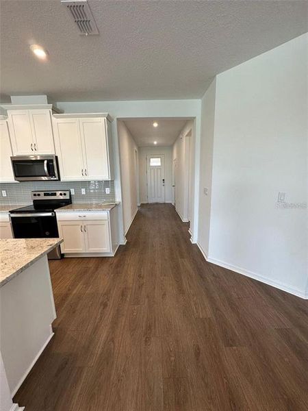 Furnished interior view inside a new home in Soleil, Kissimmee (Image 9).