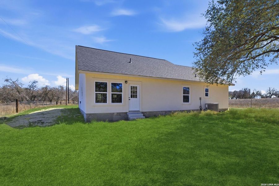 Exterior details and patio area of a home in , Floresville (Image 24).