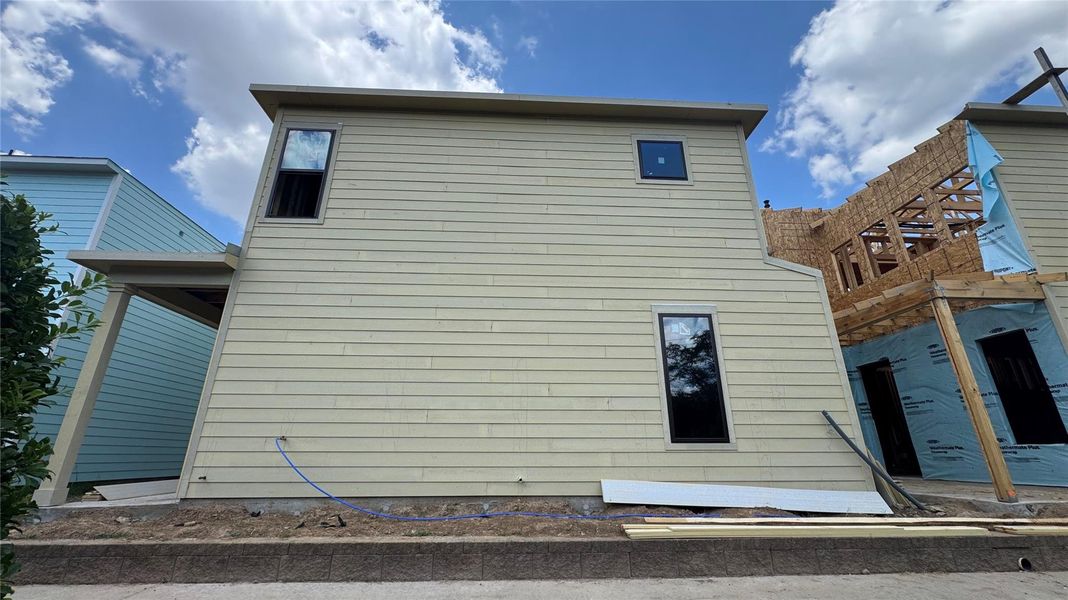 Front exterior of a new home in Timbergrove Trails, Houston, TX, highlighting curb appeal (Image 4). Front exterior of a new home in Timbergrove Trails, Houston, TX, highlighting curb appeal (Image 4).