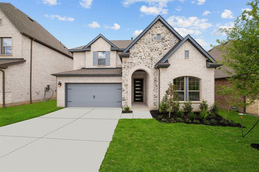 Front exterior of a new home in Highwoods, Fort Worth, TX, highlighting curb appeal (Image 19). Front exterior of a new home in Highwoods, Fort Worth, TX, highlighting curb appeal (Image 19).