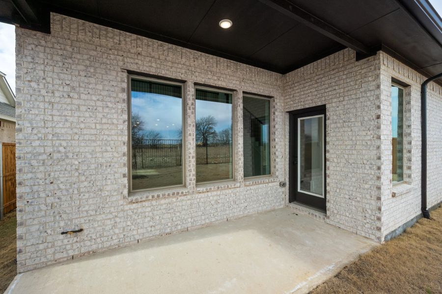 Exterior details and patio area of a home in Timberbrook, Justin (Image 1). Exterior details and patio area of a home in Timberbrook, Justin (Image 1).