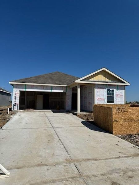 Front exterior of a new home in Cedar Pointe, Crosby, TX, highlighting curb appeal (Image 1).