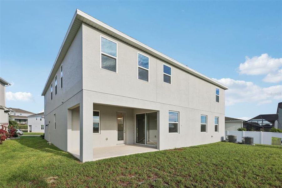 Front exterior of a new home in , Groveland, FL, highlighting curb appeal (Image 23). Front exterior of a new home in , Groveland, FL, highlighting curb appeal (Image 23).