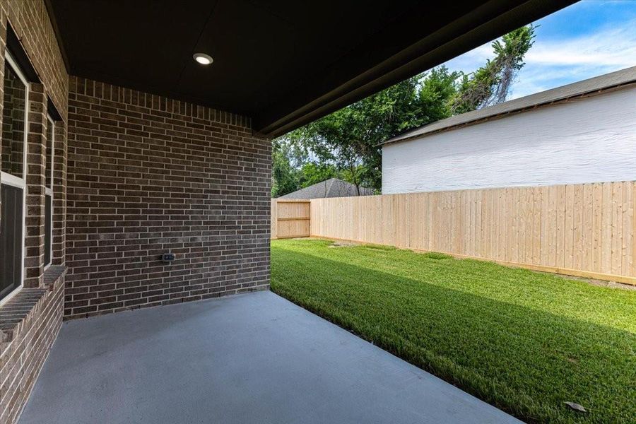 Exterior details and patio area of a home in , Houston (Image 3). Exterior details and patio area of a home in , Houston (Image 3).