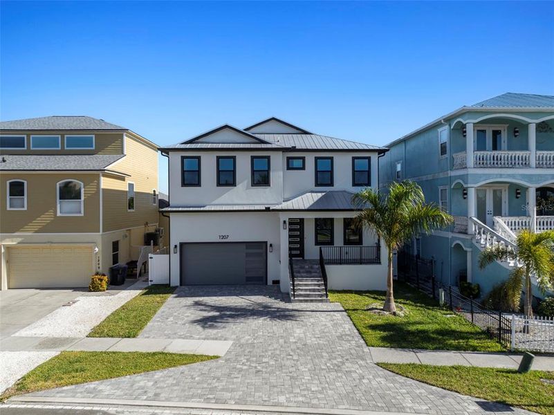 Front exterior of a new home in , Apollo Beach, FL, highlighting curb appeal (Image 2).