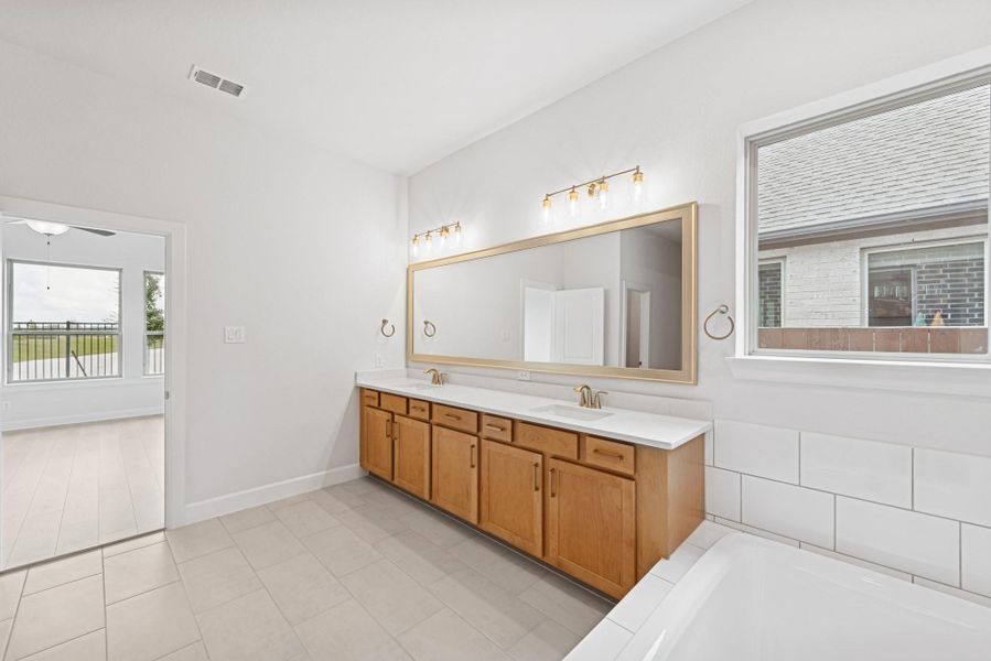 Furnished interior view inside a new home in Meridiana 55' Homesites, Manvel (Image 5). Furnished interior view inside a new home in Meridiana 55' Homesites, Manvel (Image 5).