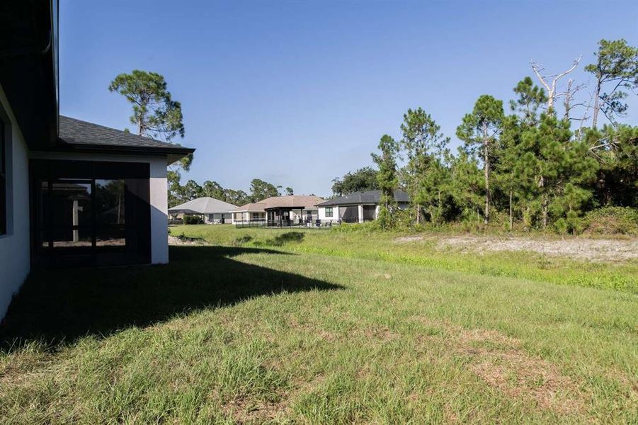 Exterior details and patio area of a home in , North Port (Image 31).