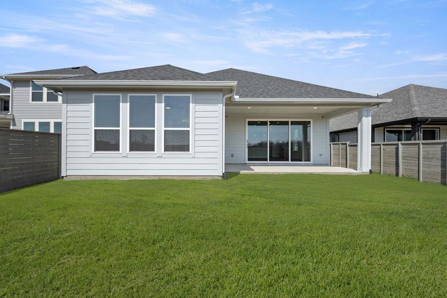 Exterior details and patio area of a home in Treeline, Justin (Image 4).