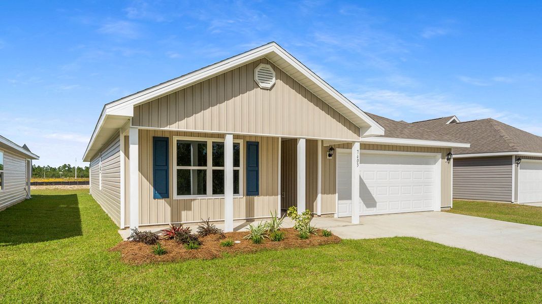 Front exterior of a new home in Morningside, Panama City, FL, highlighting curb appeal (Image 22).