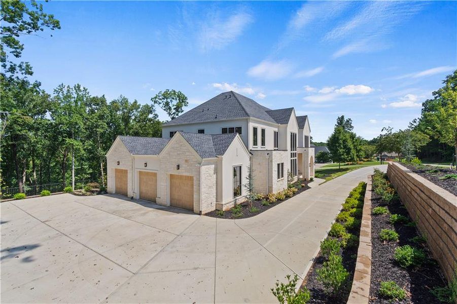 Front exterior of a new home in , Alpharetta, GA, highlighting curb appeal (Image 26).