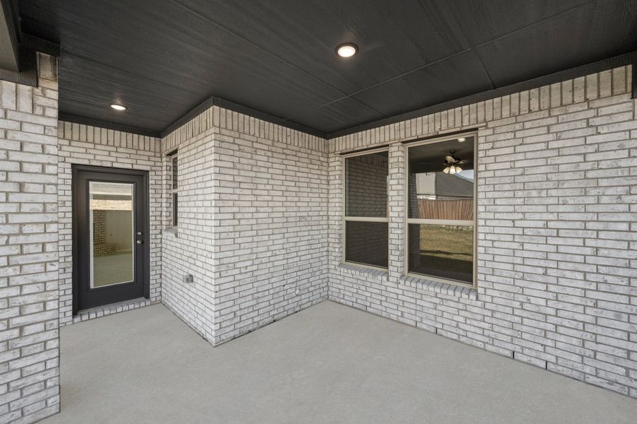 Front exterior of a new home in Myrtle Creek, Waxahachie, TX, highlighting curb appeal (Image 29). Front exterior of a new home in Myrtle Creek, Waxahachie, TX, highlighting curb appeal (Image 29).