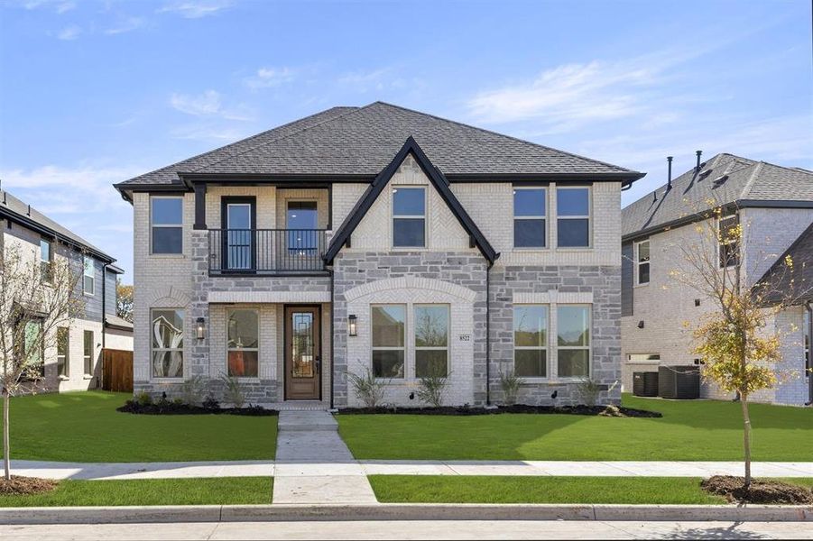 Front exterior of a new home in Trails at Cottonwood Creek, Rowlett, TX, highlighting curb appeal (Image 18).