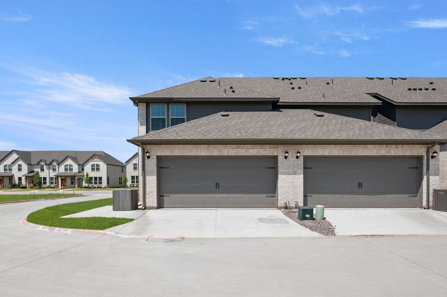 Front exterior of a new home in Sanger Circle – Townhomes, Sanger, TX, highlighting curb appeal (Image 27).