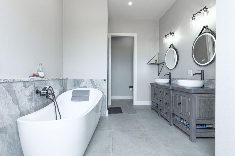 Spa-like bathroom with stand-alone soaking tub and walk-in shower.
