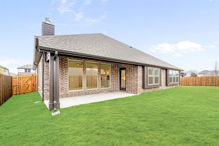 Exterior details and patio area of a home in West Crossing, Anna (Image 27). Exterior details and patio area of a home in West Crossing, Anna (Image 27).
