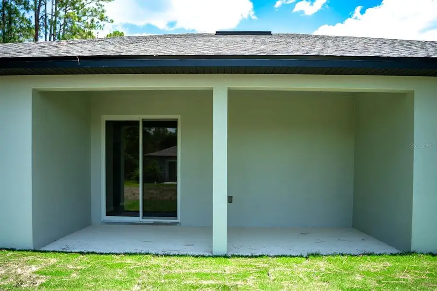 Exterior details and patio area of a home in Palm Coast, Palm Coast (Image 20).