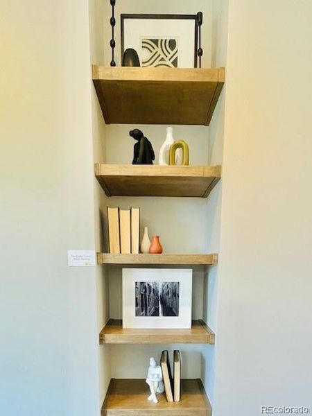Custom maple shelving in Living area!
