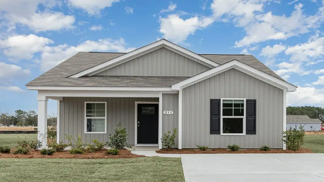 Front exterior of a new home in The Forest at Black Bear, Longs, SC, highlighting curb appeal (Image 2).