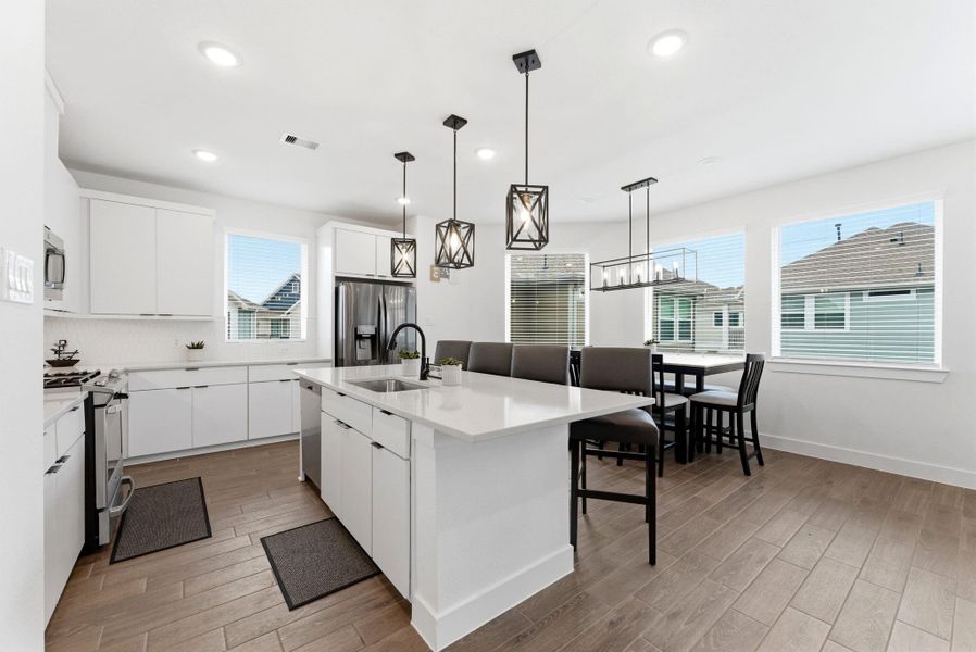 Inviting dining space perfectly positioned beside the kitchen—ideal for everyday meals or hosting dinner with friends.