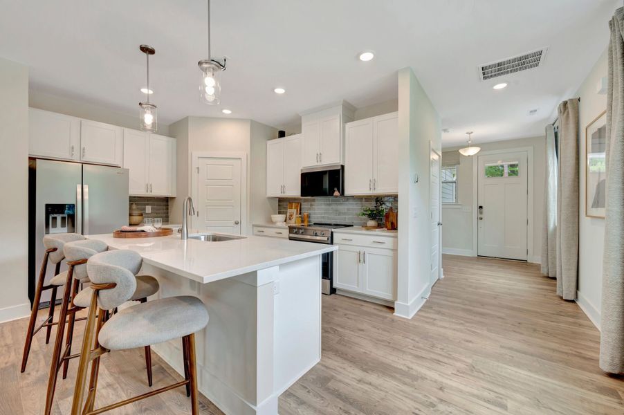 Representative furnished interior of a home built from the Valencia II by Mattamy Homes in Ashmore Townes, Garner (Image 11). Representative furnished interior of a home built from the Valencia II by Mattamy Homes in Ashmore Townes, Garner (Image 11).