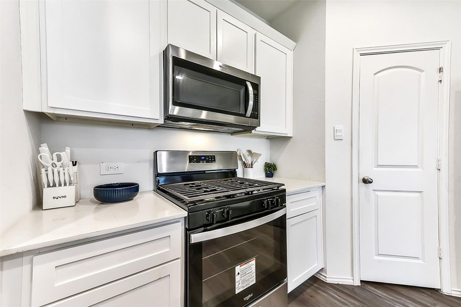 Furnished interior view inside a new home in Sunterra, Katy (Image 18).