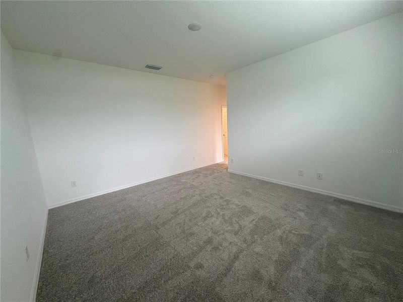 Spacious, unfurnished interior of a new home in Brack Ranch, St. Cloud (Image 15).
