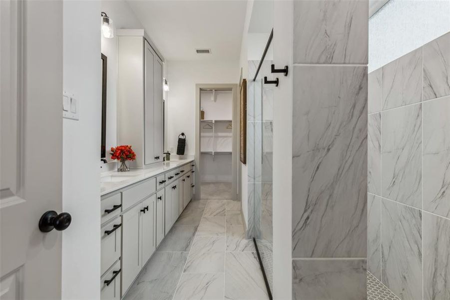 Featuring outstanding room for two and an oversized, walk in shower, this dream owner's bath is waiting for you to call it your own!