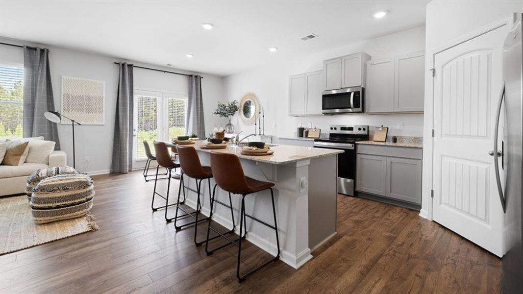 Furnished interior view inside a new home in Oaks at Cedar Grove, Fairburn (Image 5).