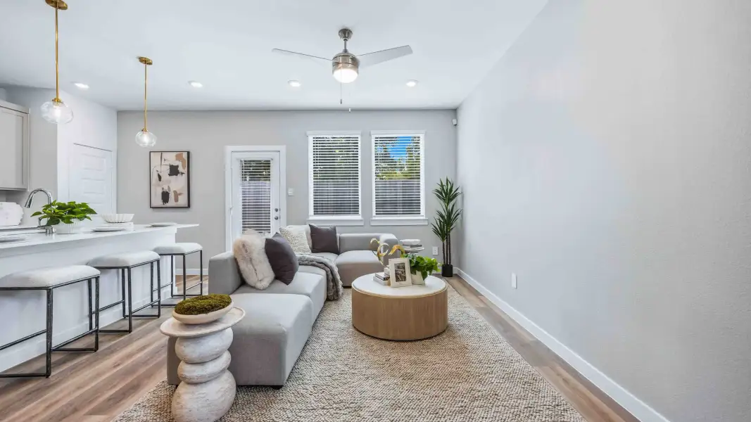 Representative furnished interior of a home built from the Gardenia by D.R. Horton in Palmi, Houston (Image 5).
