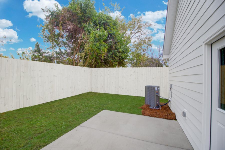 Exterior details and patio area of a home in , Charleston (Image 2). Exterior details and patio area of a home in , Charleston (Image 2).
