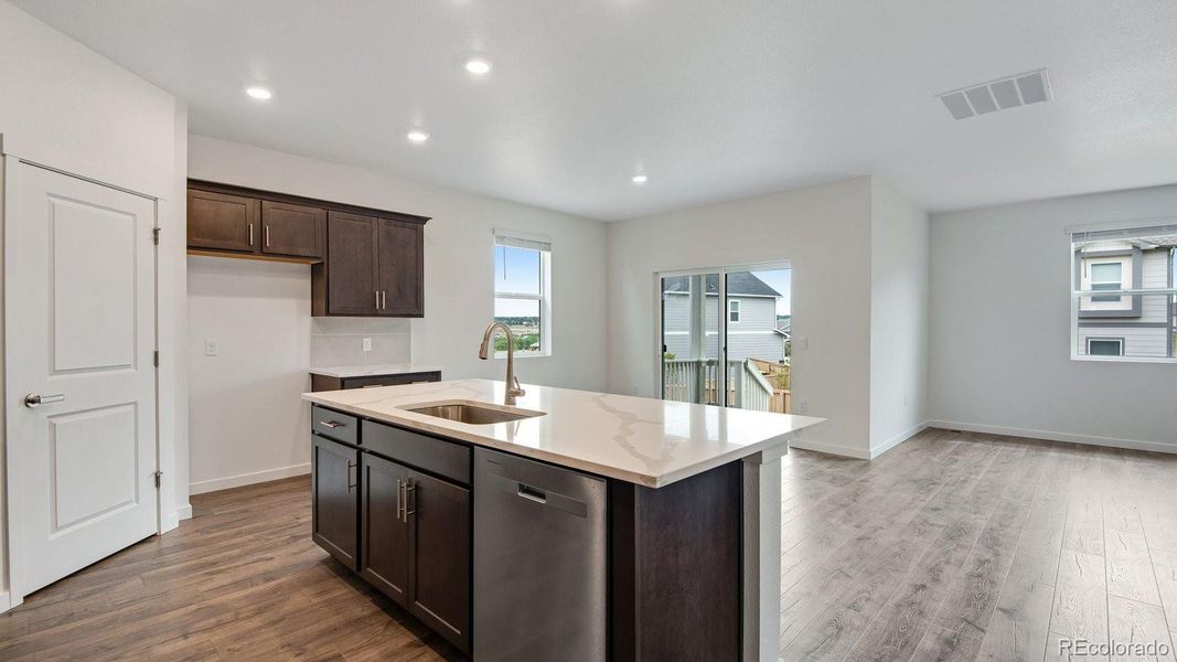Furnished interior view inside a new home in Trails at Crowfoot, Parker (Image 7).