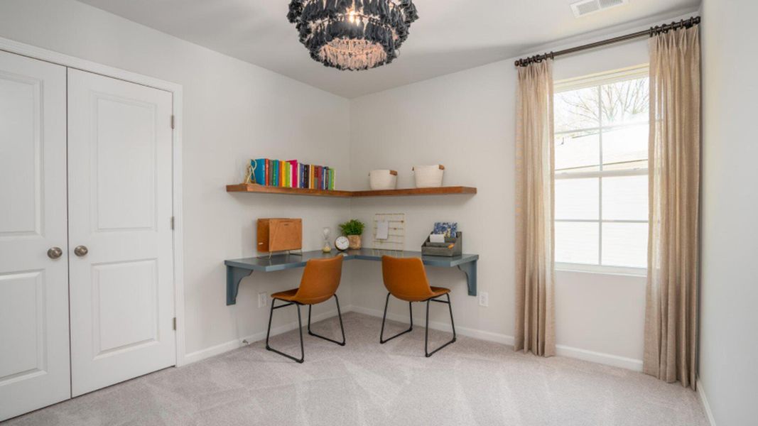 Furnished interior view inside a new home in Lindera Preserve at Cane Bay Plantation: American Dream Series, Summerville (Image 14). Furnished interior view inside a new home in Lindera Preserve at Cane Bay Plantation: American Dream Series, Summerville (Image 14).