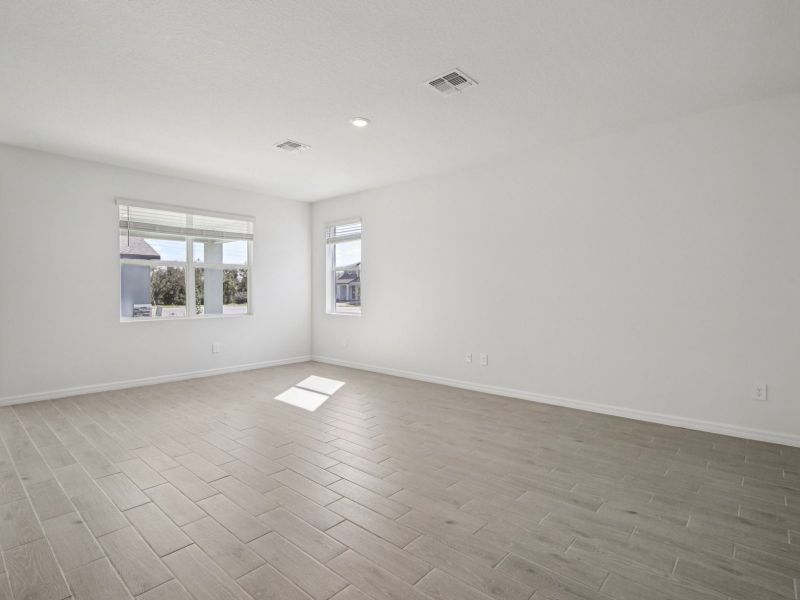 Spacious, unfurnished interior of a new home in Coasterra - Reserve Series, Palmetto (Image 10).