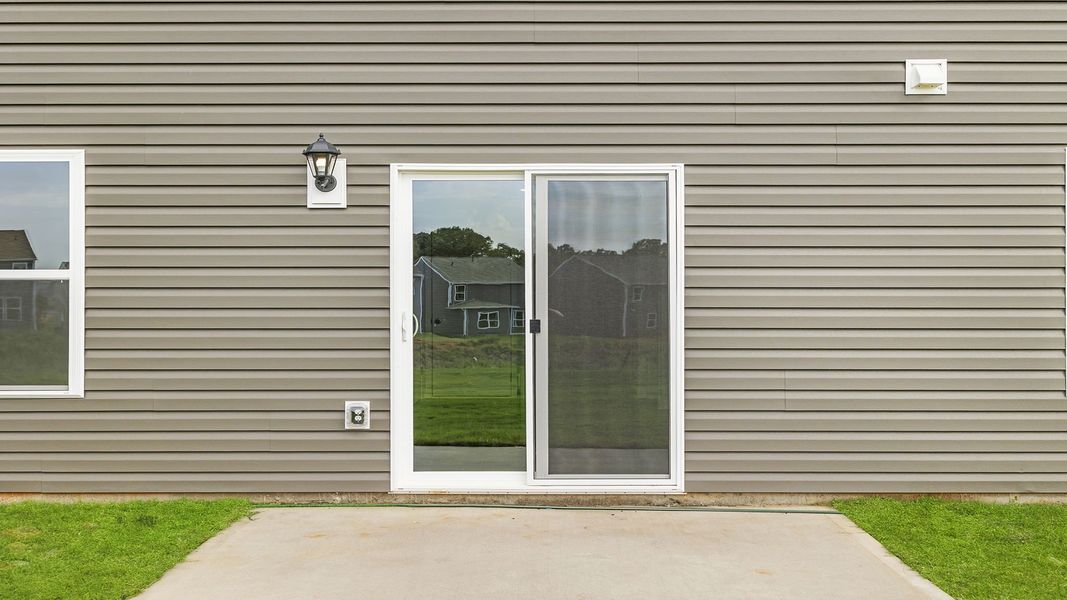 Front exterior of a new home in Lightwood Cottages, Moore, SC, highlighting curb appeal (Image 19).