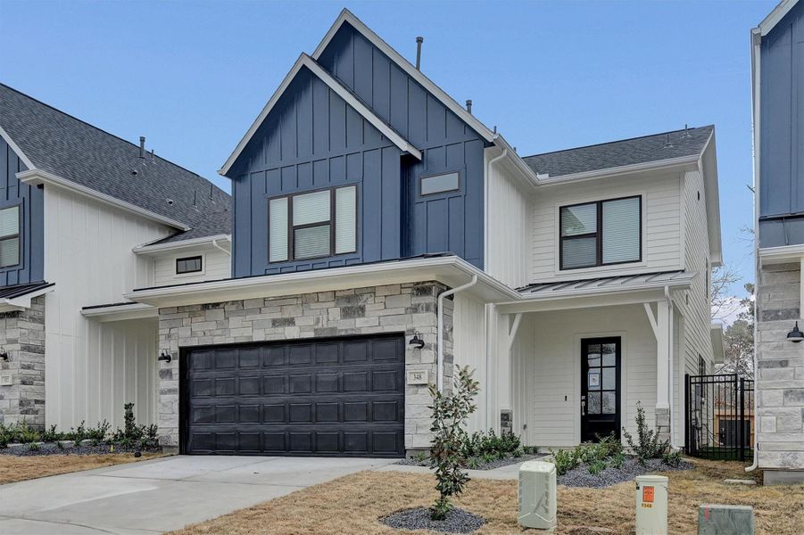 Front exterior of a new home in Summer Place  35', Montgomery, TX, highlighting curb appeal (Image 25).