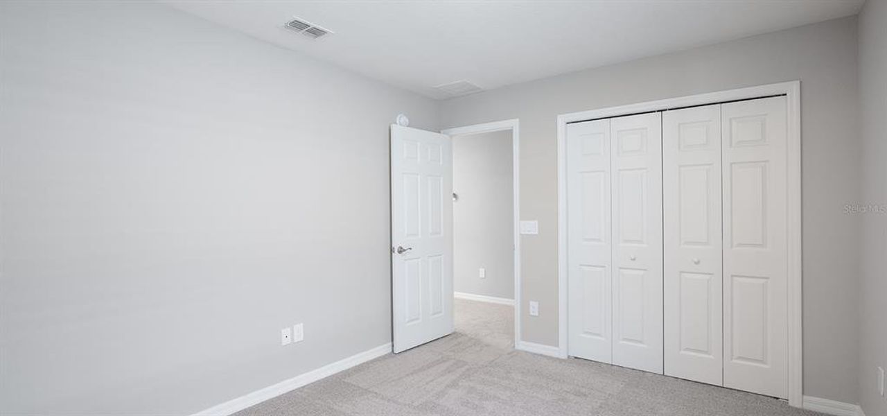 Spacious, unfurnished interior of a new home in The Crossings - Bungalows, St. Cloud (Image 10).