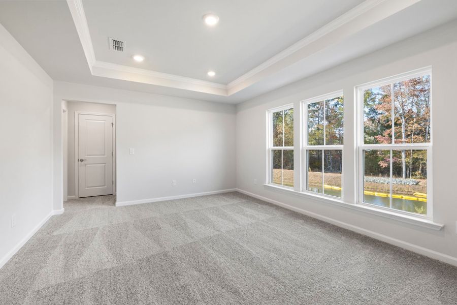 Spacious, unfurnished interior of a new home in Poets Walk, Whitsett (Image 12).