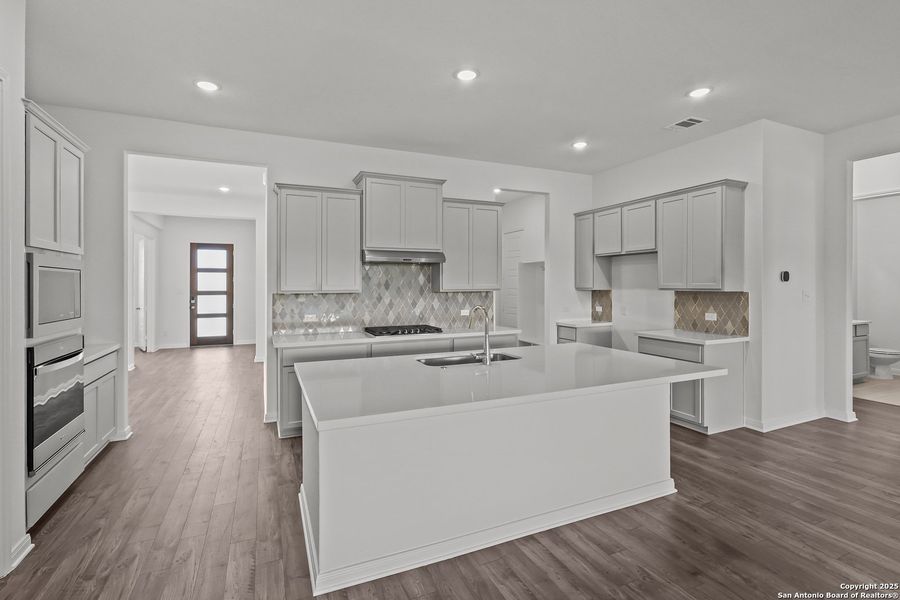 Furnished interior view inside a new home in Homestead 65', Schertz (Image 5).