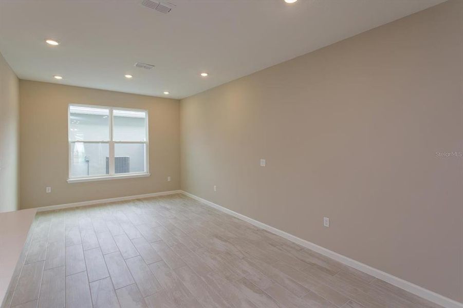 Spacious, unfurnished interior of a new home in Serenade at Ovation, Winter Garden (Image 20).