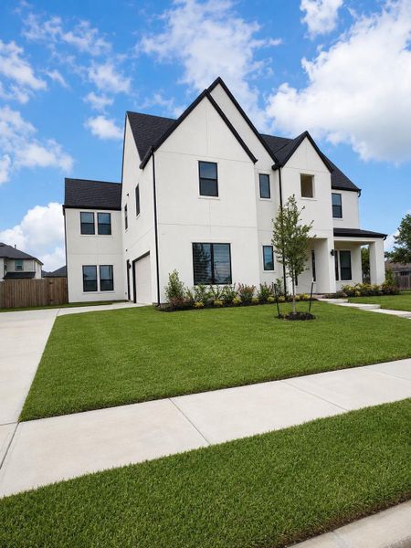 Front exterior of a new home in , Houston, TX, highlighting curb appeal (Image 1). Front exterior of a new home in , Houston, TX, highlighting curb appeal (Image 1).