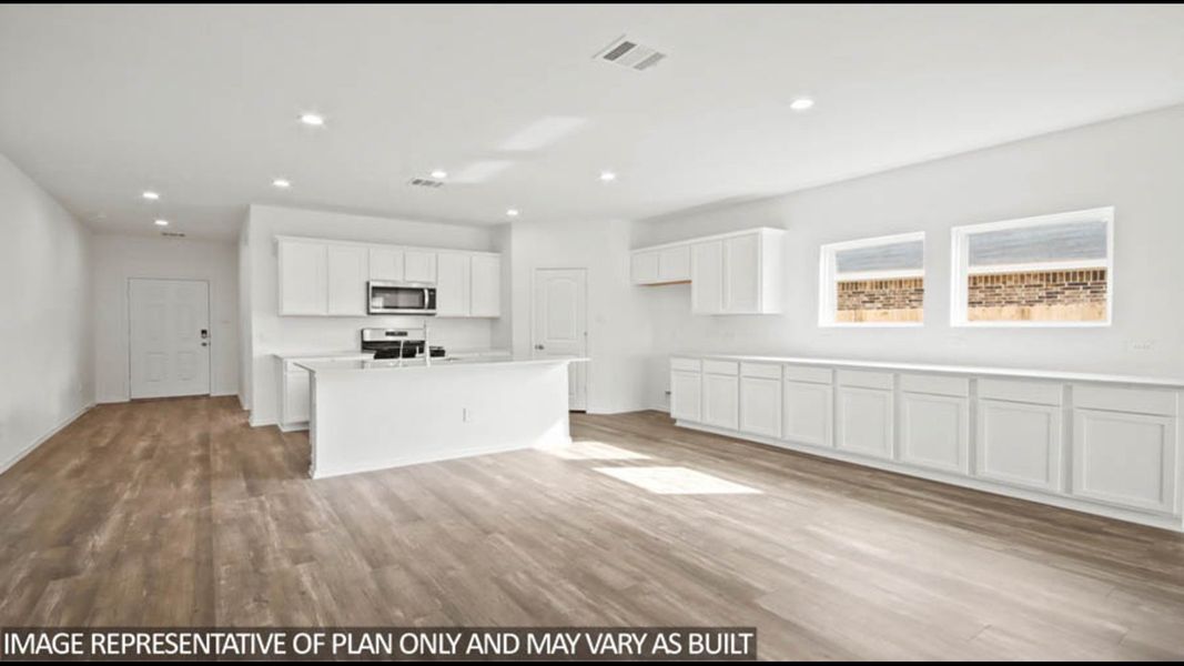 Furnished interior view inside a new home in Sunterra Lakes, Brookshire (Image 3).