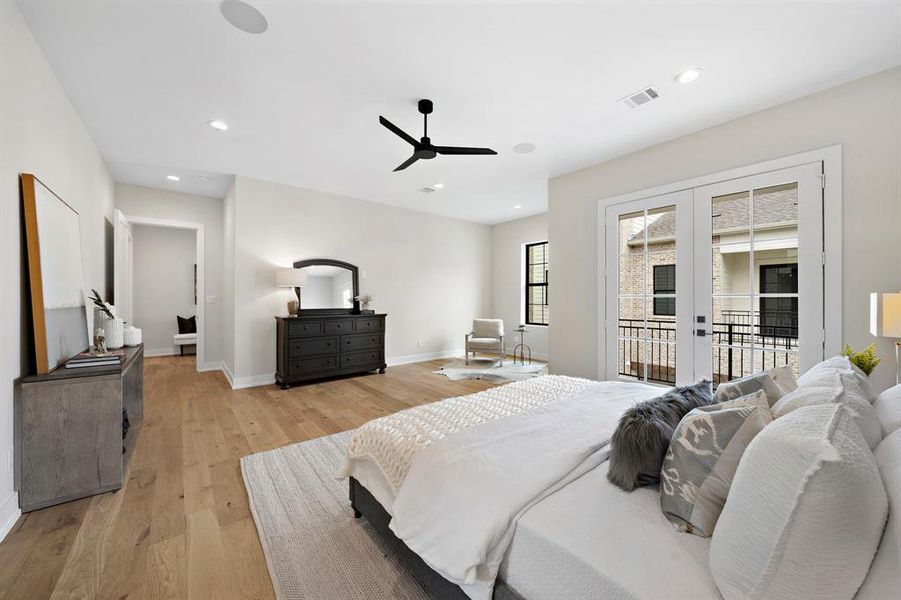 A sitting area, balcony, and in-ceiling speakers make this suite a perfect place to unwind.