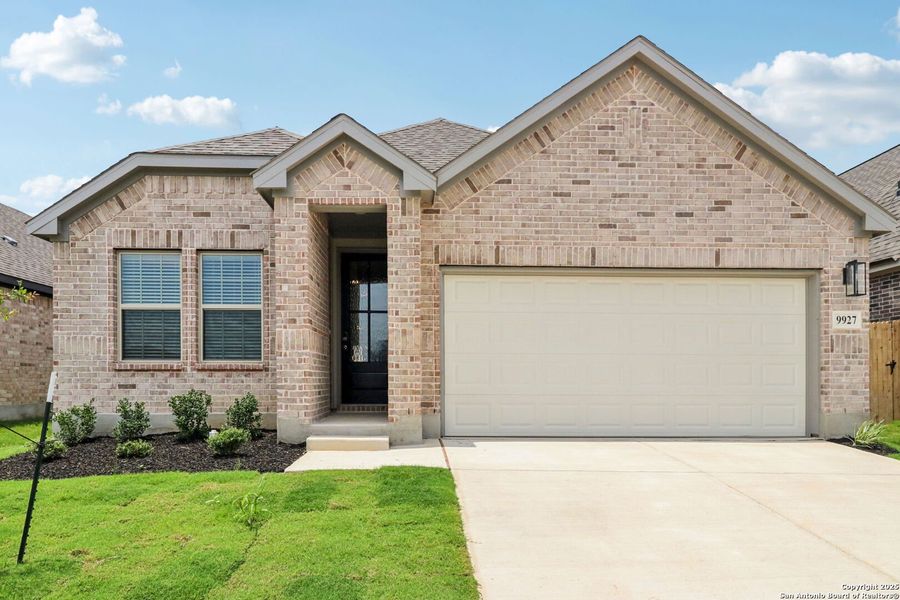 Front exterior of a new home in Kallison Ranch, San Antonio, TX, highlighting curb appeal (Image 23). Front exterior of a new home in Kallison Ranch, San Antonio, TX, highlighting curb appeal (Image 23).