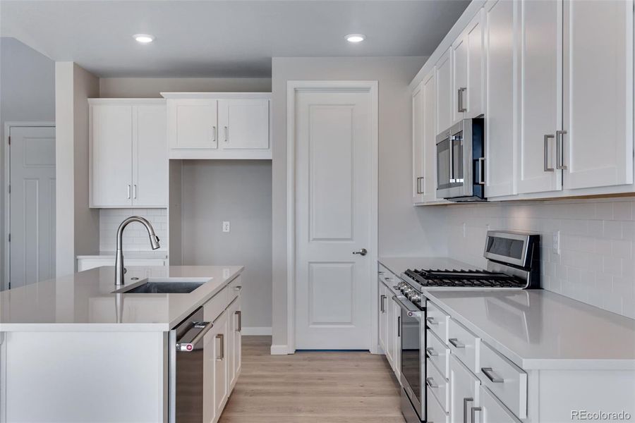 Furnished interior view inside a new home in Reunion Ridge, Commerce City (Image 12).