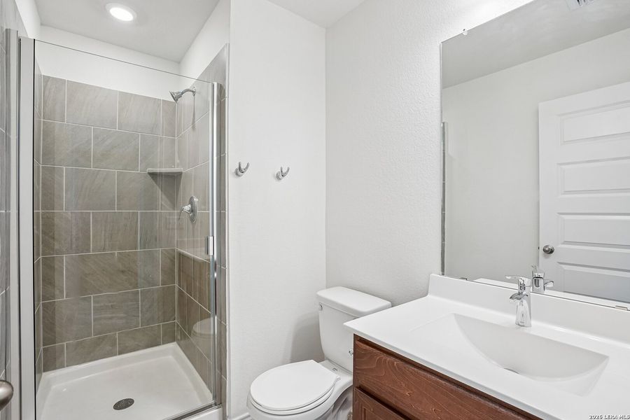 Furnished interior view inside a new home in Medina Crossing, Von Ormy (Image 8).