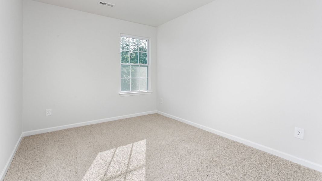 Spacious, unfurnished interior of a new home in Henley Ridge, Graham (Image 18).