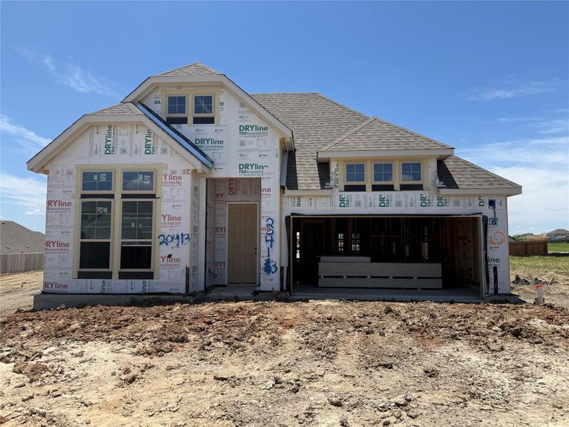 In-progress construction of a new home in Carillon, Manor, TX (Image 6).