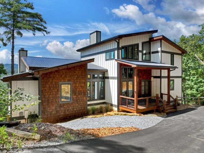 Front exterior of a new home in , Epworth, GA, highlighting curb appeal (Image 26).